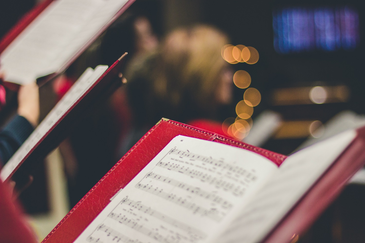 The image shows a book of sheet music
